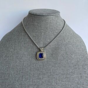 Elegant Silver and Gold Necklace with Blue Pendant